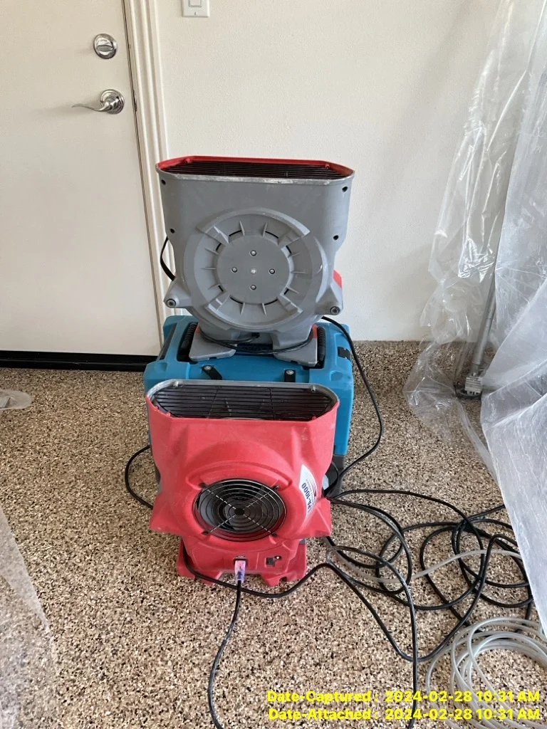 Drying equipment deployed after burst pipe water damage